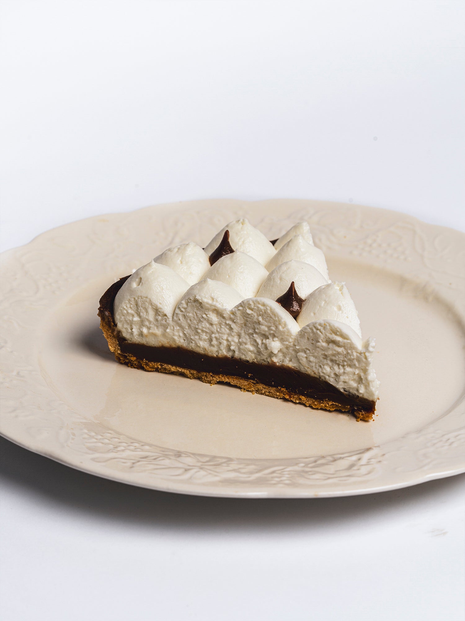 Porción Tarta de dulce de leche y crema de queso de OMA by Luchi